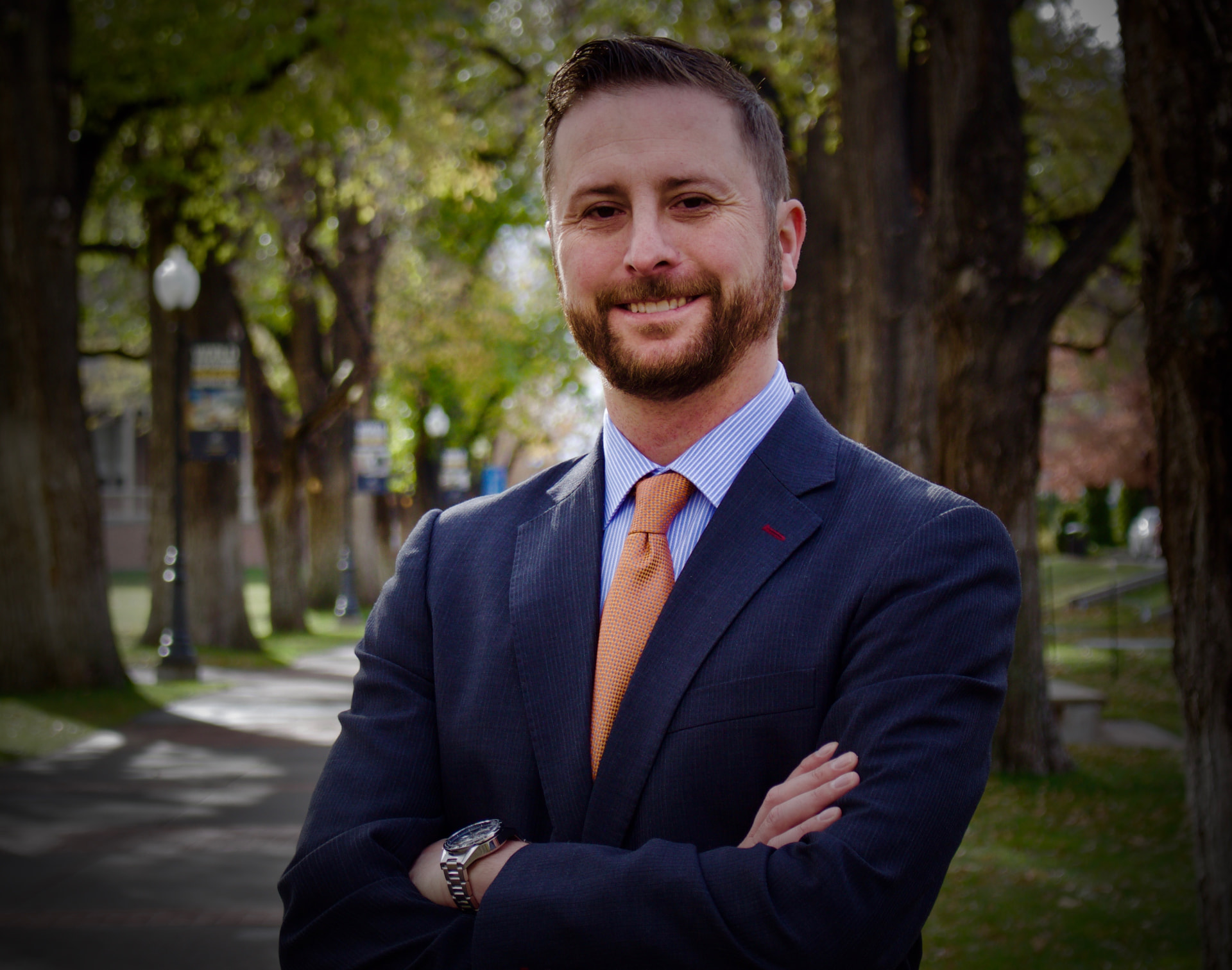 Steve Tafoya, founding mediator of Midline Mediation, in a navy suit